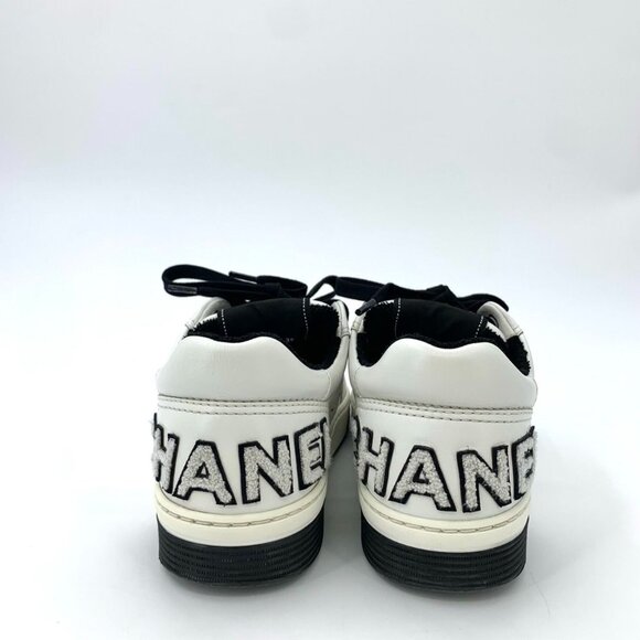 Chanel White Leather Low-Top Sneakers With Black Accents & Logo Detailing - Picture 4 of 8